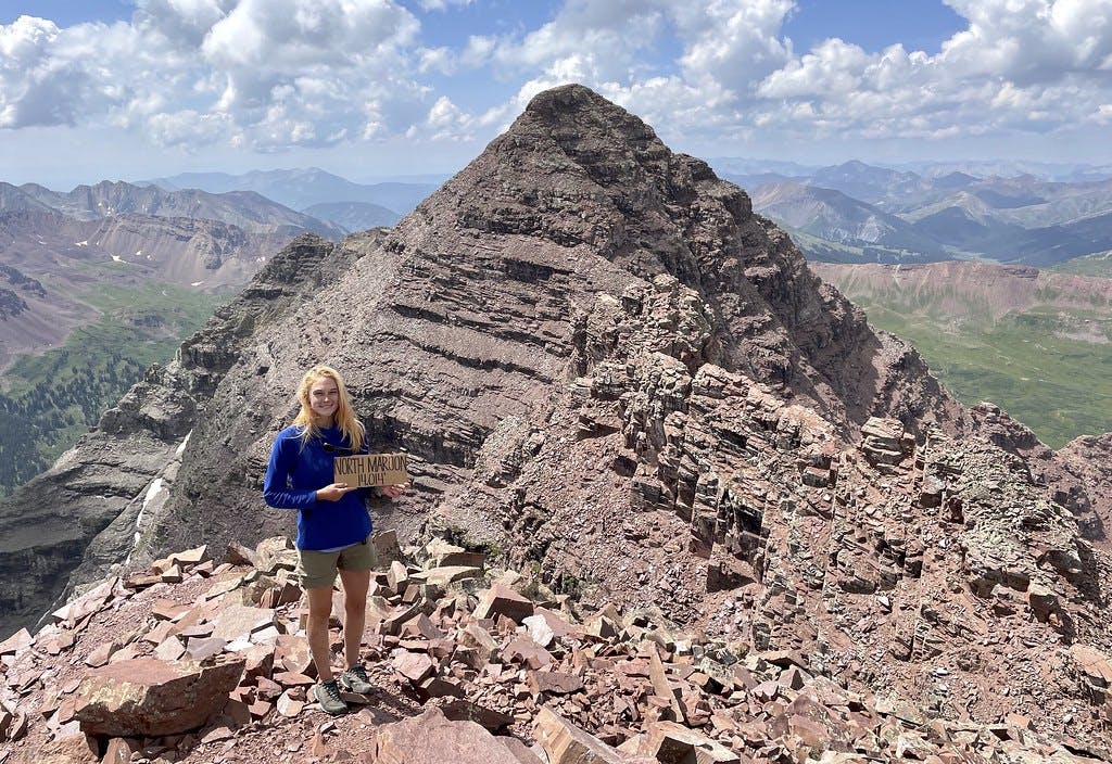 Standing on North Maroon’s summit with Maroon Peak and the route we just traversed in the background.