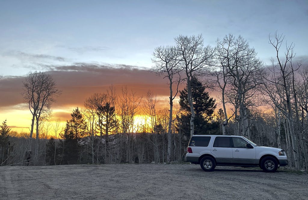 The beginning of sunrise, seen from the parking lot.